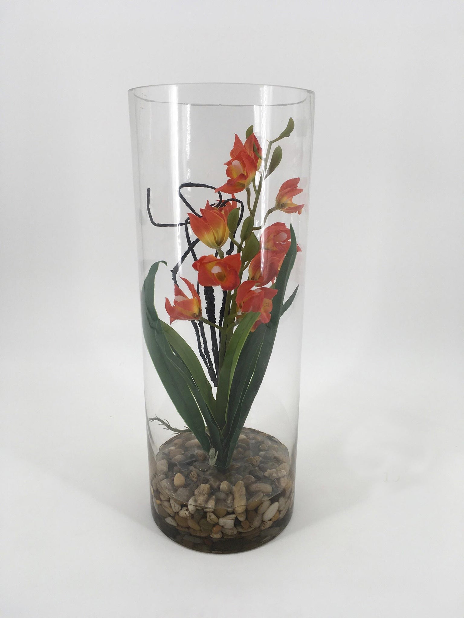 Orange Flower in Glass Vase with Rocks